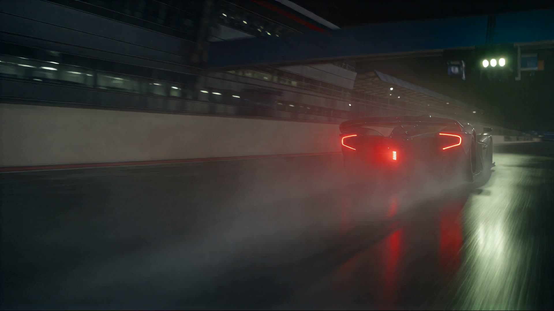 A point of light opening into a flash, just before the car leaves the pit lane.